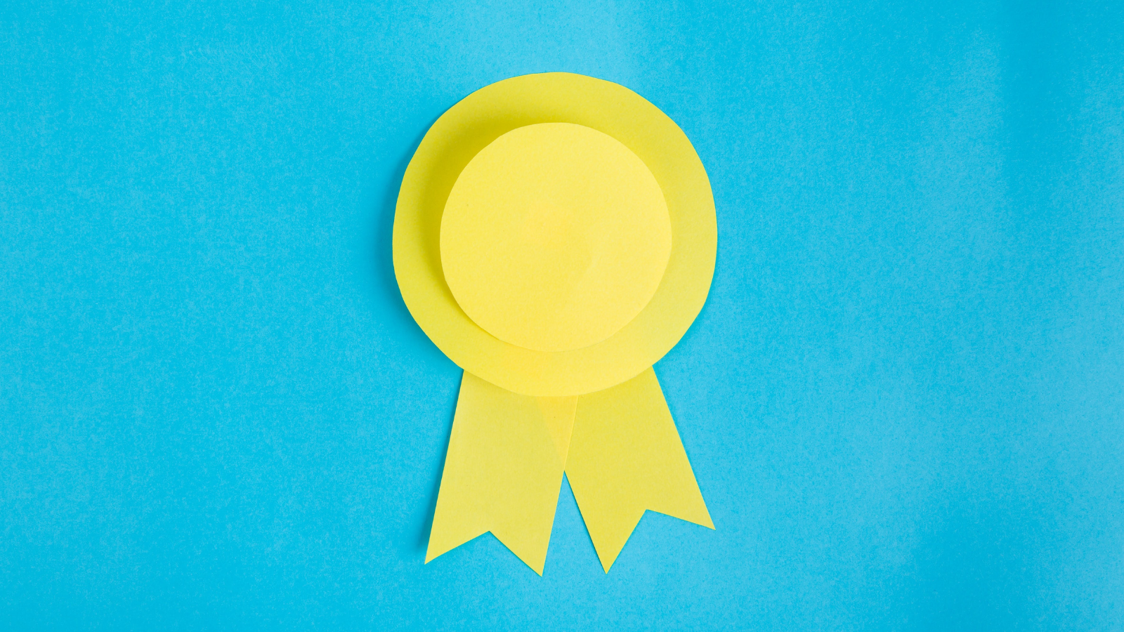 Yellow ribbon agains blue background
