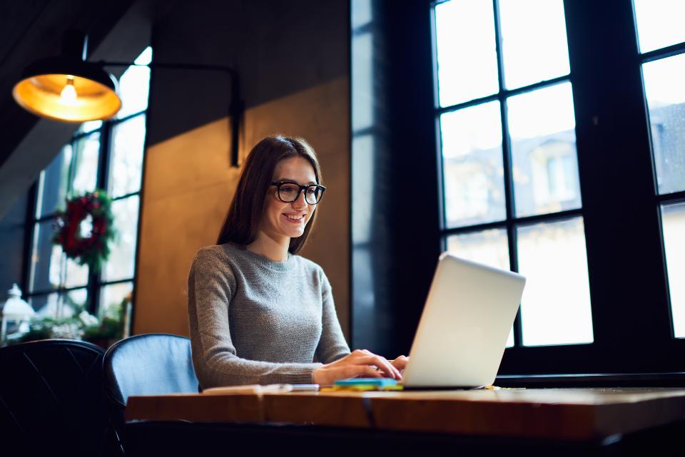 Woman typing on laptop