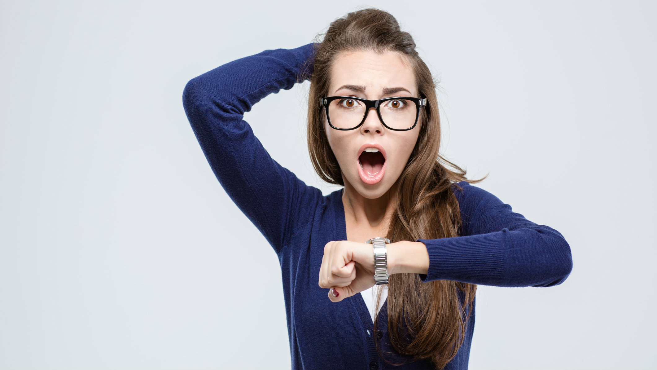 Attractive woman looking at her watch