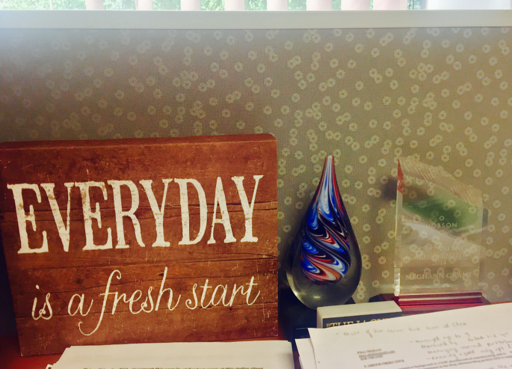 Wooden sign on desk